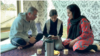 Afghan refugee Ahmad Zahir Sultani sits with his wife and daughter in Islamabad, Pakistan. (Muska Safi/VOA)