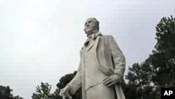 A concrete and fiberglass depiction of 'Big Sam' Sam Houston stands more than 20 meters tall on display in Huntsville, Texas. The statue is considered the largest statue of any American hero.