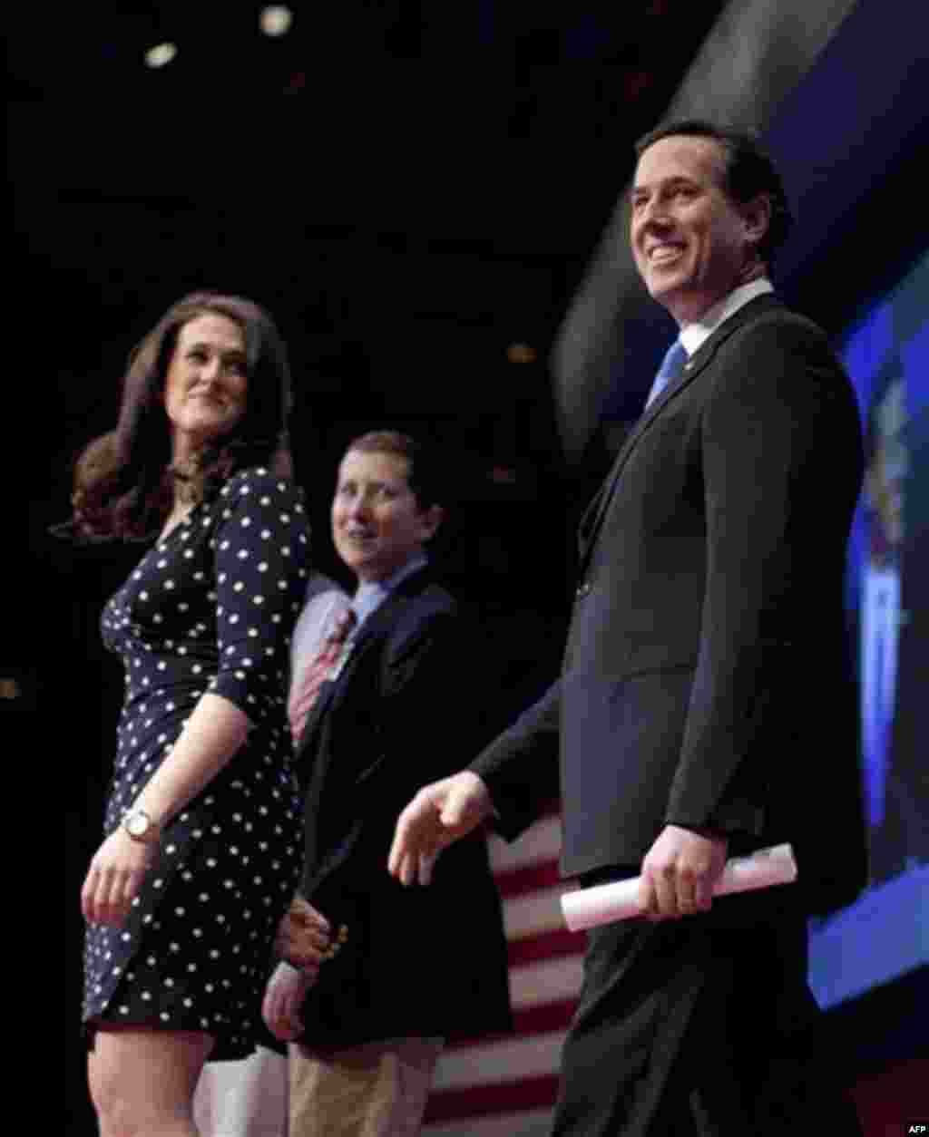 Republican presidential candidate, former Pennsylvania Sen. Rick Santorum arrives to speak at the Conservative Political Action Conference, Friday, Feb. 10, 2012, in Washington. (AP Photo/Evan Vucci)