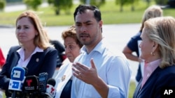 FILE - Rep. Joaquin Castro, D-Texas, second from right, speaks during a news conference after touring the Homestead Temporary Shelter for Unaccompanied Children, in Homestead, Fla., Feb. 19, 2019. 