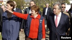 EU Commissioner for International Cooperation, Humanitarian Aid and Crisis Response Kristalina Georgieva gestures during a visit with United Nations High Commissioner for Refugees (UNHCR) Antonio Guterres (R) to Saadnayel in the Bekaa valley December 15, 2012. 