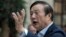 FILE - Ren Zhengfei, founder and CEO of Huawei, gestures during a meeting with reporters in Shenzhen city, south China's Guangdong province, Jan. 15, 2019. 