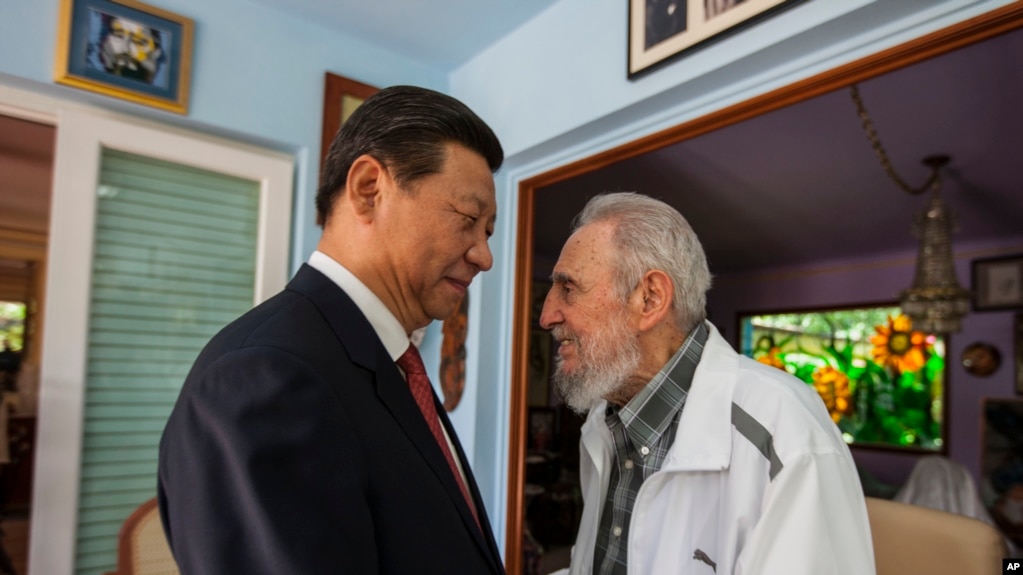 卡斯特罗与中国国家主席习近平(photo:VOA)