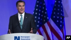 Republican presidential candidate, former Massachusetts Gov. Mitt Romney speaks at the Newspapers Association of America/ American Society of News Editors luncheon gathering in Washington, Wednesday, April 4, 2012. 
