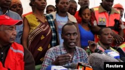 Ralson Saisi Wasike, father to Dealeryn Saisi Wasike, a baby girl rescued from the rubble of a six-storey building that collapsed after days of heavy rain addresses a news conference in Nairobi, Kenya, May 3, 2016. 