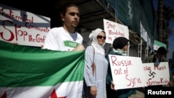 Syrian-Americans protest Russian intervention in Syria outside a Russian consular office in Santa Monica, California, United States, October 6, 2015.