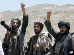 FILE - Taliban fighters are seen in Shindand district, Herat province, Afghanistan, May 27 2016.