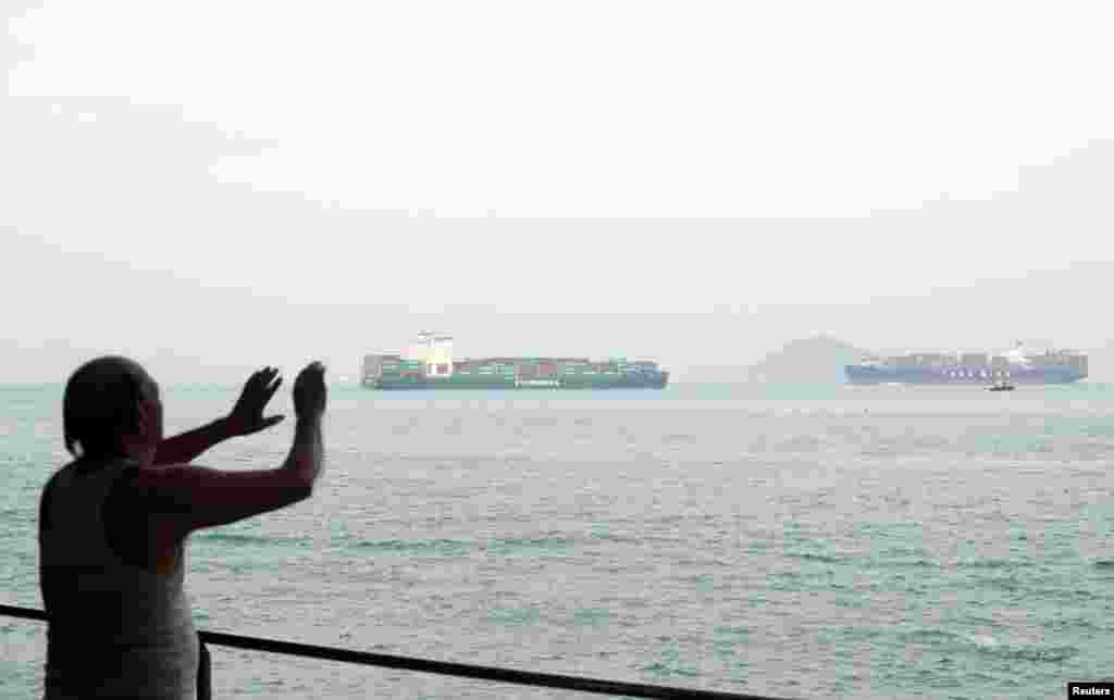 A man exercises at the Sai Wan Swimming Shed in Hong Kong, China, October 7, 2018. REUTERS/Hannah McKay