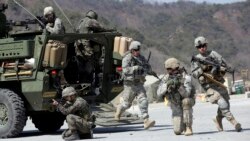 VOA Asia - U.S., South Korea suspend military exercises.