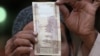 India Moves to Boost Value of Rupee