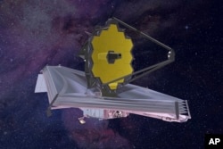 This 2015 artist's rendering provided by Northrop Grumman, via NASA, shows the James Webb Space Telescope. (Northrop Grumman/NASA via AP)