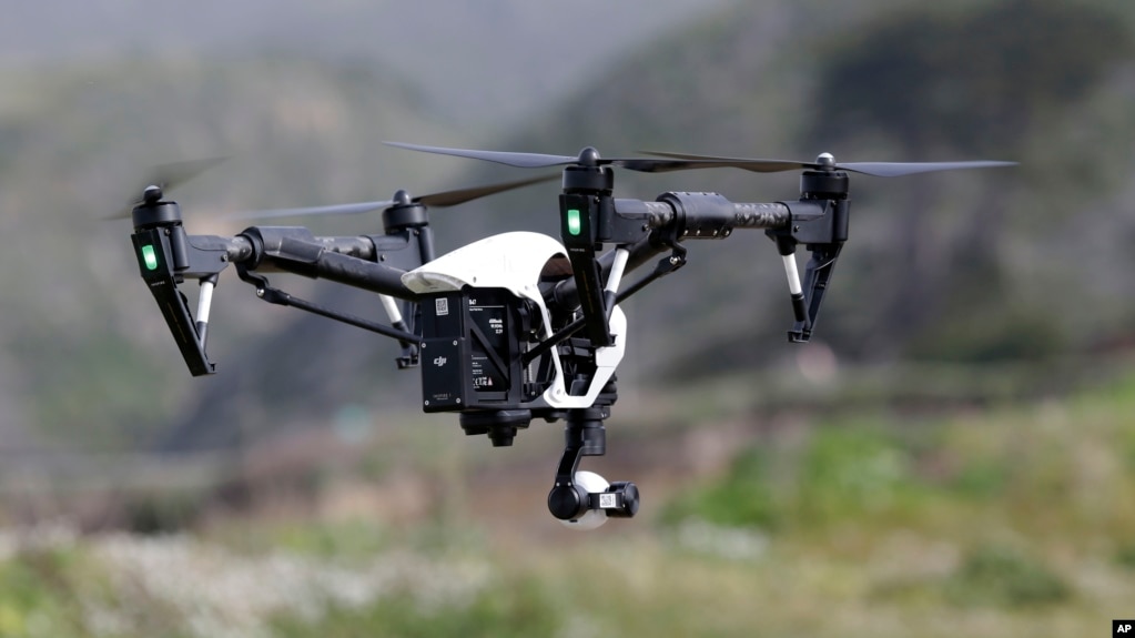 FILE - The Inspire 1, a drone manufactured by DJI, is flown in Davenport, Calif., March 10, 2015. 
