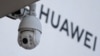 Kamera za nadzor ispred prodavnice kompanije Huavei, u Pekingu