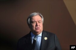 FILE - U.N. Secretary-General Antonio Guterres addresses delegates during the opening session of a U.N. Migration Conference in Marrakech, Morocco, Dec.10, 2018.