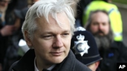 In this Feb. 1, 2012 file photo, Julian Assange, the 40-year-old WikiLeaks founder, arrives at the Supreme Court in London.