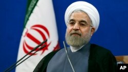 Iran's President Hassan Rouhani, speaking at a Tehran news conference on the second anniversary of his election, June 13, 2015. 