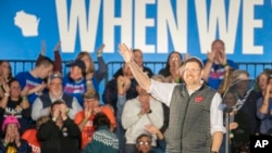 FILE - Ben Wikler, chairman of the Democratic Party of Wisconsin, waves to the crowd before Vice President Kamala Harris speaks at an event on Nov. 1, 2024, in Little Chute, Wisconsin. Wikler is a candidate to chair the Democratic National Committee, which will vote Feb. 1, 2025.