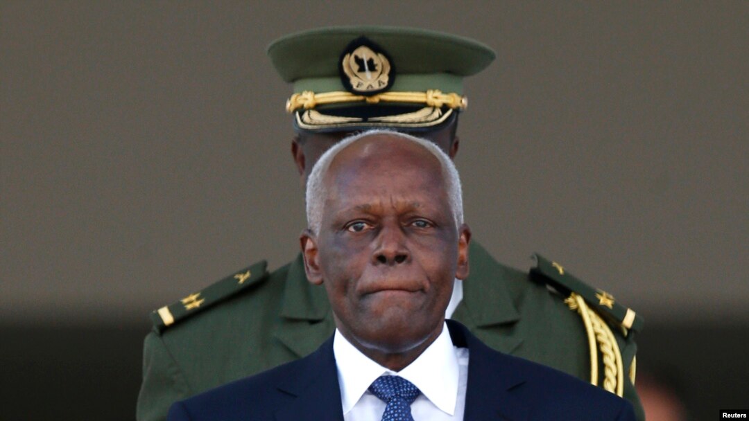 FILE - Angolan President Jose Eduardo dos Santos leaves the Planalto Palace after a meeting with Brazil's President Dilma Rousseff in Brasilia, June 16, 2014. 