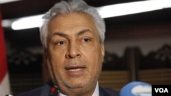 Iraq's Minister of Oil Abdul-Karim Elaibi speaks to the media in Baghdad, Iraq, Wednesday, May 30, 2012. (AP Photo/Karim Kadim)