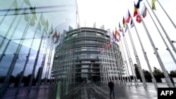 This photograph taken on Oct. 22, 2024, shows European countries' flags displayed in front of the European Parliament in Strasbourg, eastern France. 