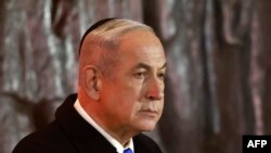 Perdana Menteri Israel Benjamin Netanyahu hadir dalam acara peringatan Holocaust di Yad Vashem Holocaust Memorial di Yerusalem pada 5 Mei 2024. (Foto: AFP/Menahem Kahana)