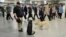 Police officers and their dogs on duty in Penn Station, April 16, 2013 in New York City