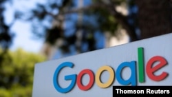FILE PHOTO: A Google sign is shown at one of the company's office complexes in Irvine