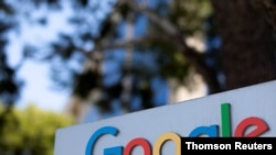 A Google sign is shown at one of the company's office complexes in Irvine. 