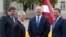 U.S. Secretary of Defense Jim Mattis greets Lithuania's Minister of Defense Raimundas Karoblis, left, Estonia's Minister of Defense Margus Tsahkna, right, and Latvia's Minister of Defense Raimonds Bergmanis, during a meeting in Vilnius, Lithuania, May 10, 2017.