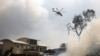 Two Dead, Dozens Hurt, 150-plus Homes Lost in Australia Wildfires