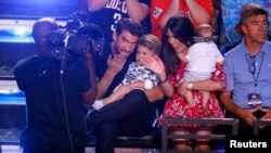 FILE - Michael Phelps and family attend the Kids Choice Sports Awards 2018 show in Los Angeles, CA, June 19, 2018.