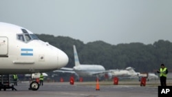 Planes sit on the tarmac at Jorge Newbery airport where flights were canceled due to an ash cloud that reached Buenos Aires from the Puyehue-Cordon Caulle volcano in Chile, grounding air travel in Buenos Aires, Argentina, June 13, 2011