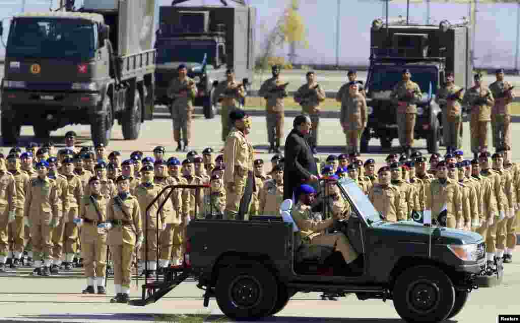 Pakistan's President Mamnoon Hussain inspects troops during Pakistan Day parade in Islamabad, March 23, 2015. 