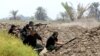 Iraq Shi'ite fighters prepare to fight militants from the extremist Islamic State group in Jurf al-Sakhar, 43 miles (70 kilometers) south of Baghdad, Iraq, Aug 18, 2014. 