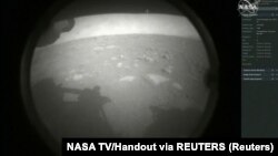 រូបភាពនៅពេលយានរុករក Perseverance បានចុះចតលើភពព្រះអង្គារដោយជោគជ័យ កាលពីថ្ងៃទី១៨ ខែកុម្ភៈ ឆ្នាំ២០២១។ (NASA/REUTERS)