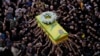 Hezbollah members carry the coffin of their comrade who was killed when a handheld device exploded, during a funeral procession in the southern suburbs of Beirut, Sept. 19, 2024. 