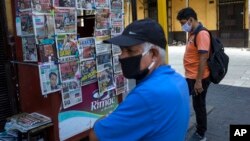 Scène de la rue durant la pandémie de Covid-19 dans le centre-ville de Lima, Pérou, 28 mars 2020. (AP Photo/Rodrigo Abd)