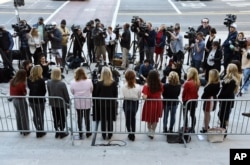 FILE - A group of women who have spoken out about Hollywood producer Harvey Weinstein's sexual misconduct and who refer to themselves as the "Silence Breakers," face the media during a news conference at Los Angeles City Hall, Feb. 25, 2020.
