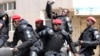 Senegalese policemen patrol during anti-government demonstrations in Dakar on April 19, 2018.