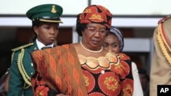 FILE - Malawi's President Joyce Banda attends a seminar on security in Abuja, Nigeria, Feb. 27, 2014. 