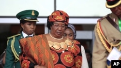 FILE - Malawi's President Joyce Banda attends a seminar on security during an event marking the centenary of the unification of Nigeria's north and south in Abuja, Nigeria, Feb. 27, 2014.