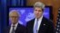 U.S. Secretary of State John Kerry (R) speaks next to Martin Indyk at the State Department in Washington, July 29, 2013.