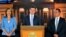 Handout picture released by the Colombian presidency press office showing Colombian President Juan Manuel Santos (C) speaking next to his wife Clemencia de Santos (L) and his doctor Felipe Gomez during a press conference at the Narino Palace, in Bogota, O