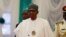 Le président Muhammadu Buhari assiste à l'ouverture de la 56e session ordinaire de l'Autorité des chefs d'État et de gouvernement de la CEDEAO à Abuja, Nigeria, le 21 décembre 2019.