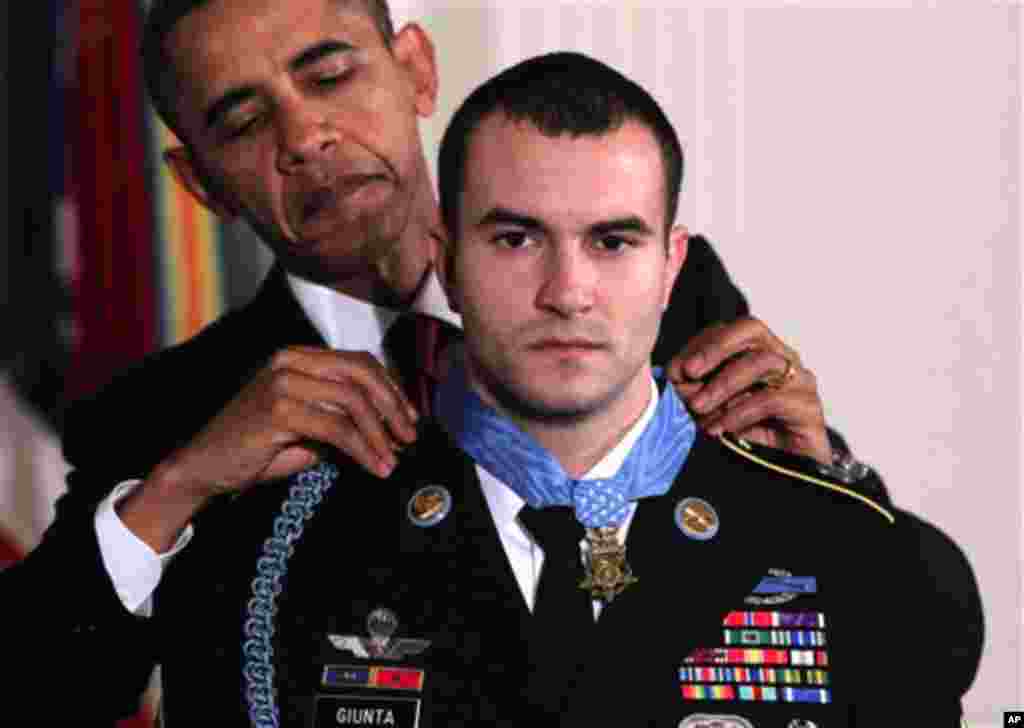 Nov. 16: President Obama presents the Medal of Honor to Staff Sgt. Salvatore Giunta, who rescued two members of his squad in October 2007 while fighting in the war in Afghanistan. (AP Photo/J. Scott Applewhite)