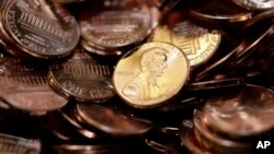 Pennies sit in a bin at the U.S. Mint in Denver, US. 