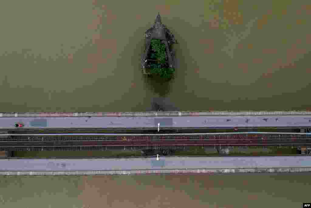 This aerial photo shows a deserted Long Bien Bridge during the government imposed "complete social isolation" order as a preventive measure against the spread of COVID-19, in Hanoi, Vietnam.