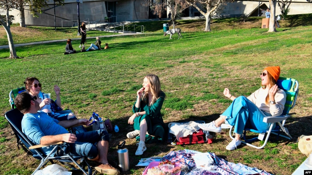 LOS ANGELES, CA - NOVEMBER 26: People gather at a picnic lunch in Pan Pacific Park during Thanksgiving on November 26, 2020 in Los Angeles, California. Americans celebrate the Thanksgiving holiday as coronavirus cases continue to surge across the…