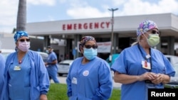 Health care workers at Fountain Valley Regional Hospital rally outside their hospital Aug. 6, 2020, for safer working conditions during the outbreak of the coronavirus disease (COVID-19) in Fountain Valley, Calif.