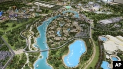 An architectural model view of the central lake and the Lapita hotel at the Dubai Parks and Resorts complex is displayed in Dubai, United Arab Emirates, March 1, 2016. 